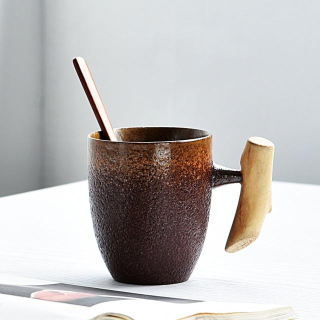 https://luvmuggs.com/cdn/shop/products/Japanese-style-Vintage-Ceramic-Coffee-Mug-Tumbler-Rust-Glaze-Tea-Milk-Beer-Mug-with-Wood-Handle.jpg_640x640_6e475ffd-4f4b-48f8-bdd3-582ca5483d17.jpg?v=1633541897