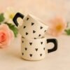 Set Of 2 Handmade Ceramic Mugs With Black Heart Design For Elegant Coffee Moments